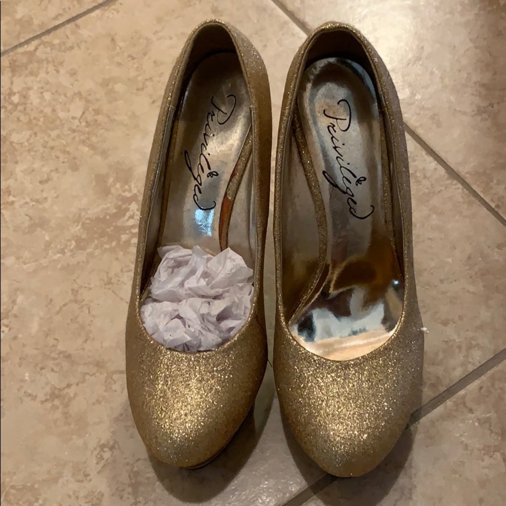 Gold stilettos